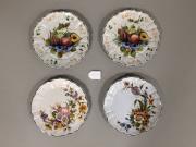 Teller mit Blumen und Früchtedekor, Fayence