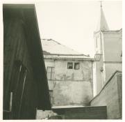 Hinteransicht des Ragenhauses, links Teil der Pfarrkirche Bruneck
