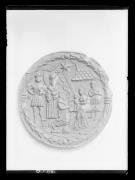 Ripresa di un oggetto. Medaglia con motivo religioso